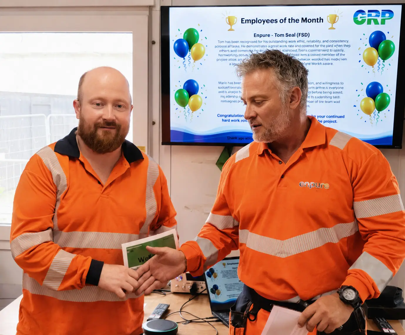 Tom Seal being awarded employee of the month